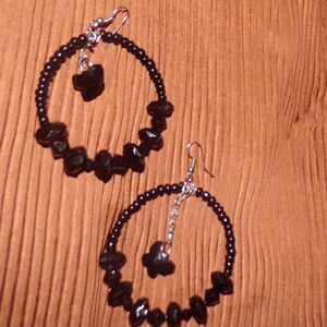 large drop hoop earrings with dangle butterflies jet black